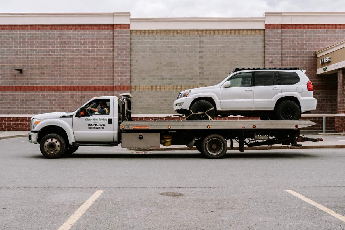 Vehicle loaded on a flatbed tow truck